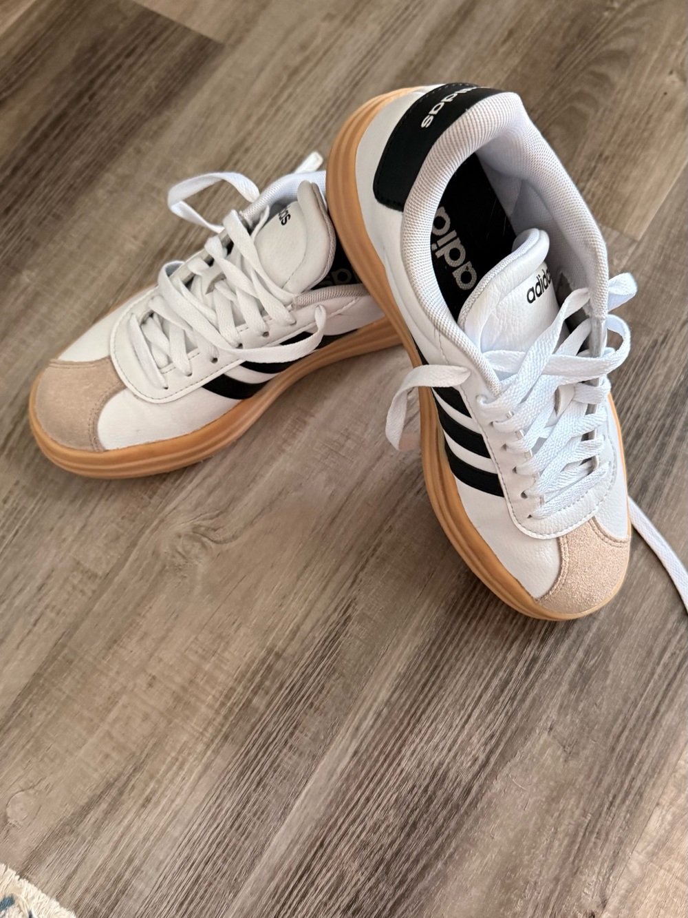 adidas women’s White Black Gum-sole Sneakers